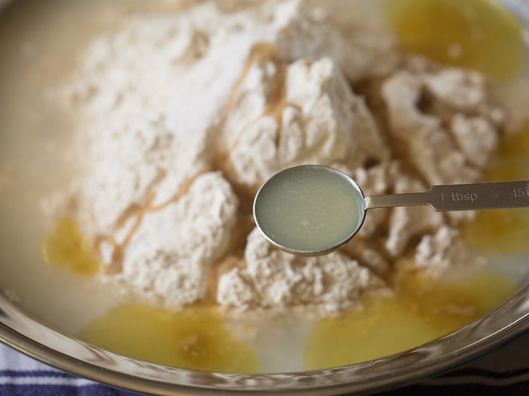 adding lemon juice to the tray. 