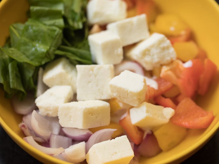 paneer cubes added to the bowl. 