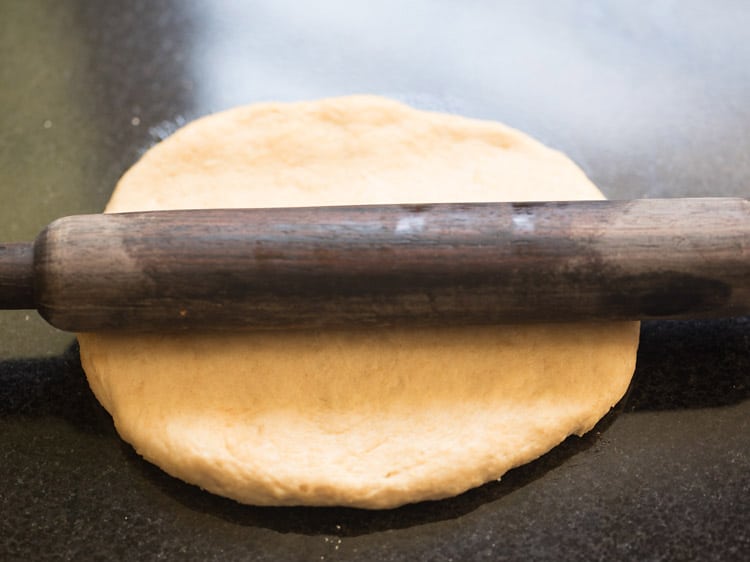 rolling the pizza dough part. 