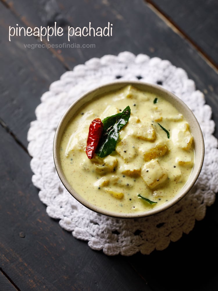 pineapple pachadi in cream colored bowl placed on top of a white doily.