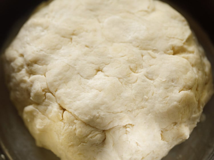 mixture combined to form a soft dough for making badusha. 