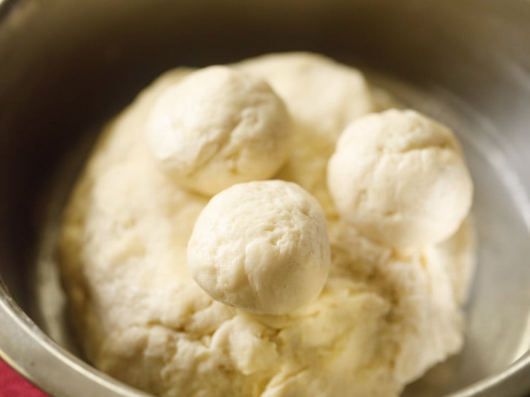 small to medium sized balls pinched from the dough for balushahi sweet. 