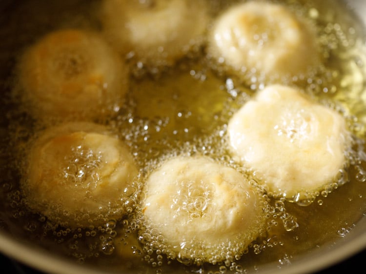 frying badusha sweet in hot oil.