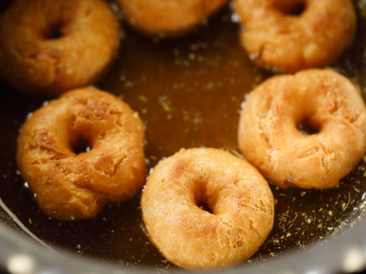 fried balushahi recipe added to warm sugar syrup. 