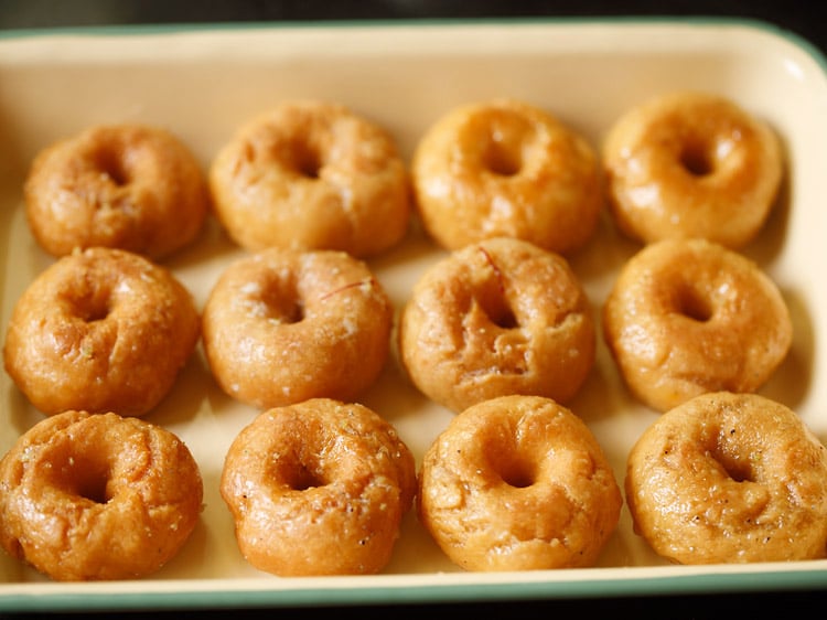 prepared balushahi recipe placed in a serving tray. 