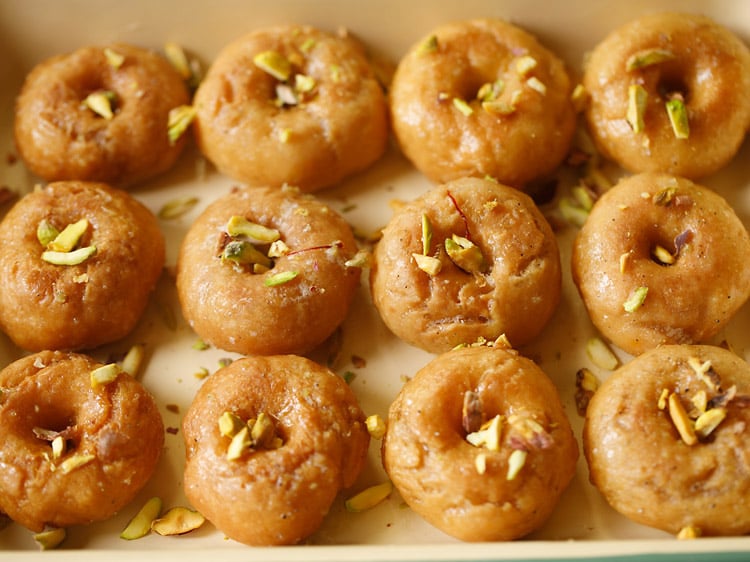 chopped pistachios sprinkled on prepared balushahi recipe. 