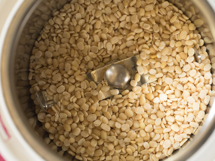 roasted urad dal added in a grinder jar.