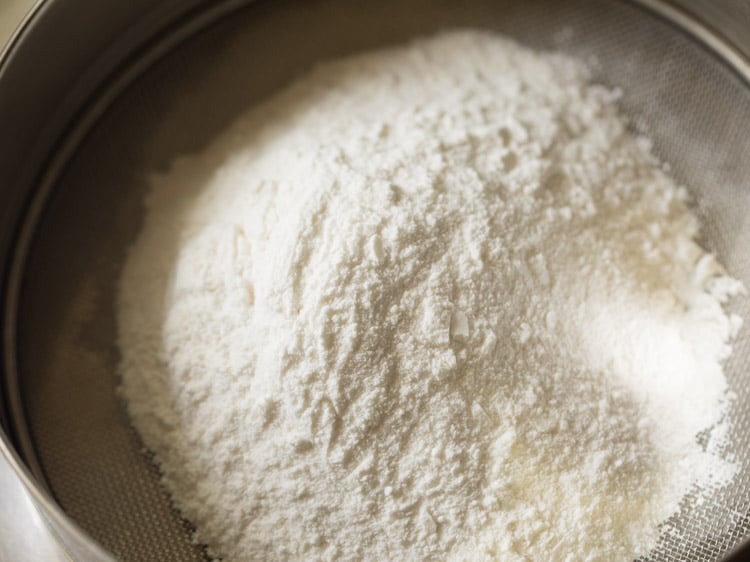sieve flour in a bowl