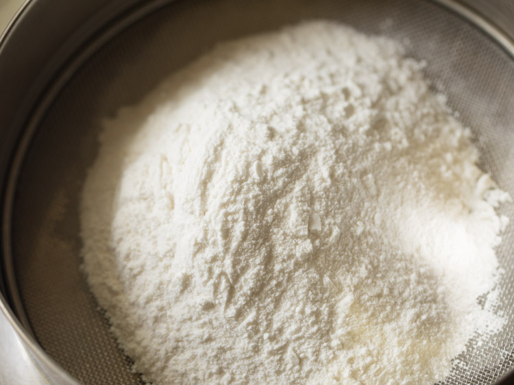 rice flour added in a fine sieve. 