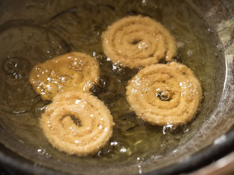 frying murukkus on the second side. 