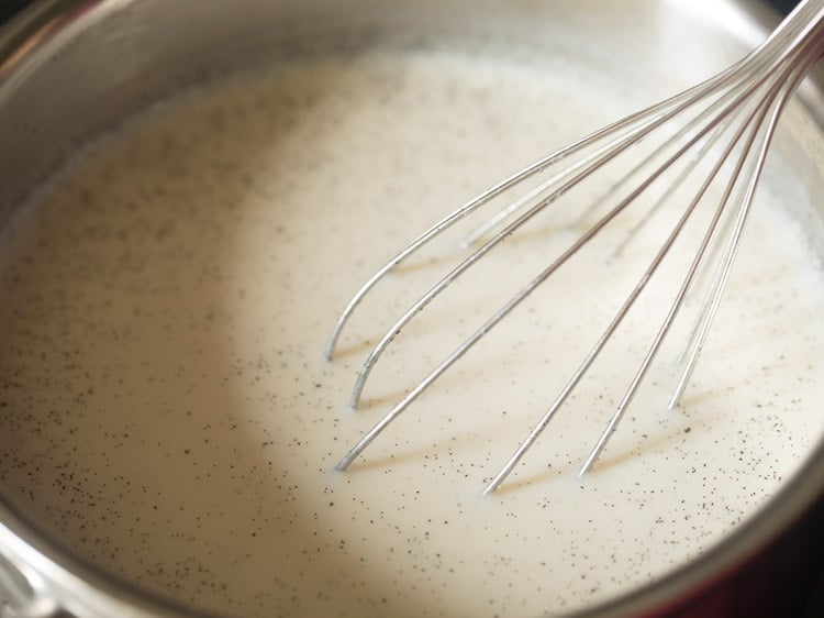 whisking egg free crème anglaise sauce.