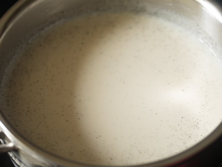 crème anglaise beginning to simmer around edges of pan.