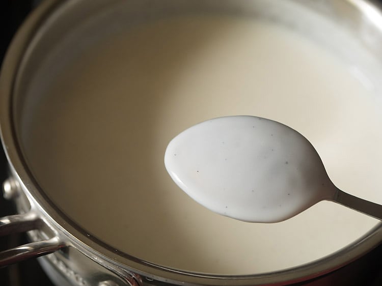making custard thick enough to coat the back of a spoon.