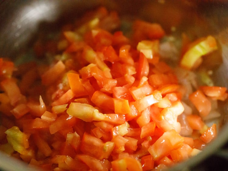 onions, garlic, tomatoes and oil in a pan