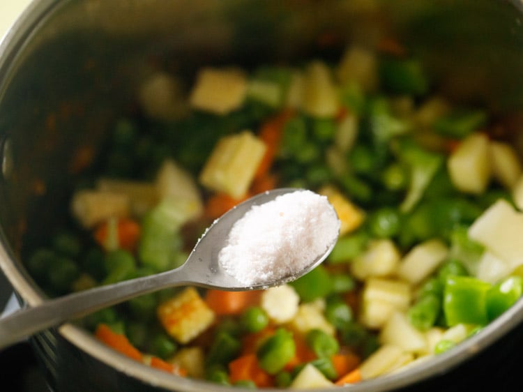 Baby corn, carrots, green beans, potatoes, capsicum, green peas and salt