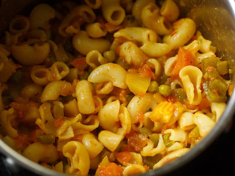 macaroni, vegetables and dried herbs.