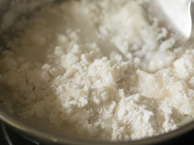 mixing the rice flour quickly with the hot water. 