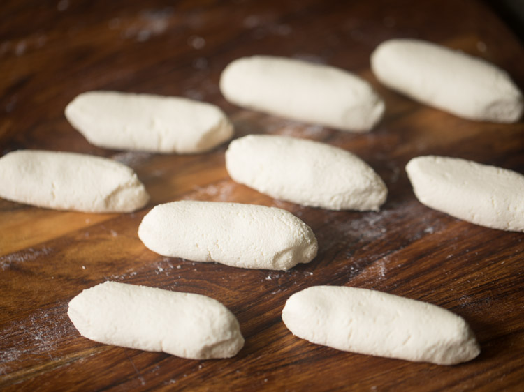 cylindrical shaped chom chom made with the kneaded chenna.