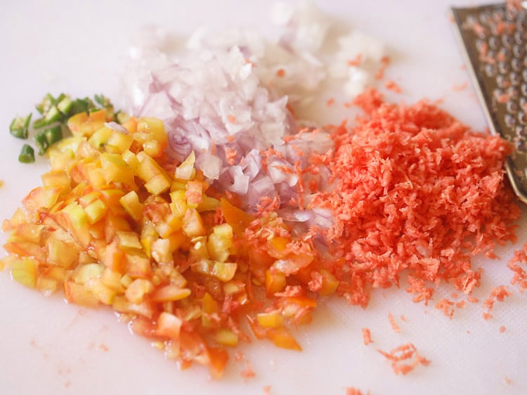 finely chopped onion, tomato, green chili and grated carrot.