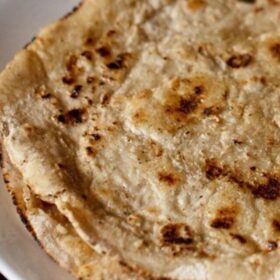 jowar roti served on a white plate.