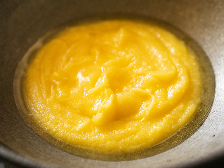 heating ghee in a heavy pan. 