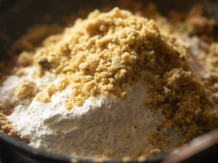 prepared gond-nut powder added to roasted wheat flour. 