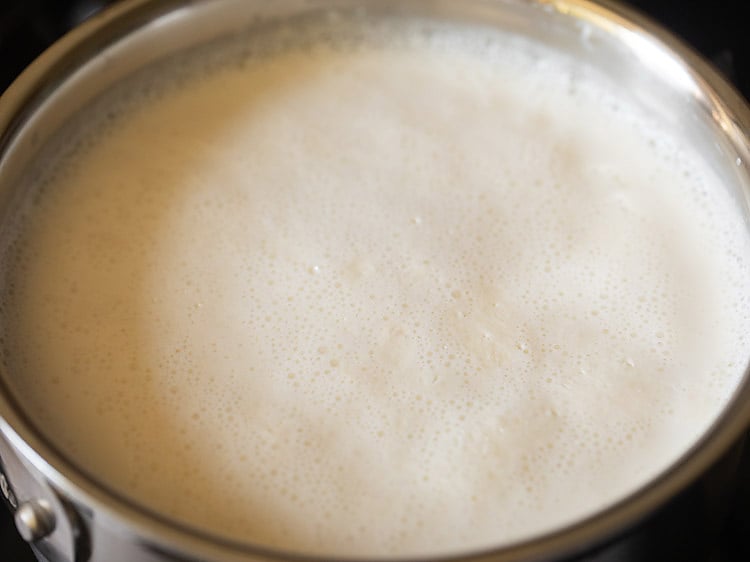 milk foaming and getting boiled to make paneer from scratch