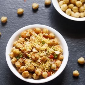 chana chaat served in a white bowl