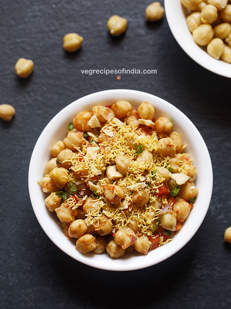 chana chaat served in a white bowl