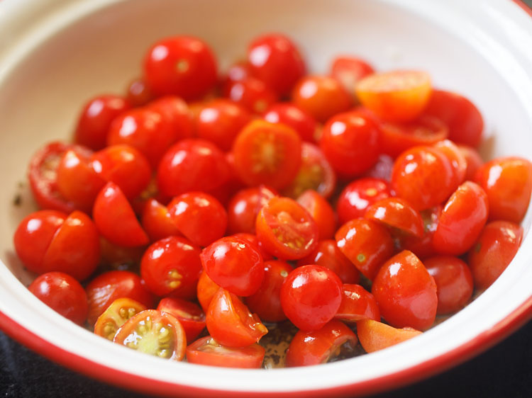 halved cherry tomatoes added in the dressing. 