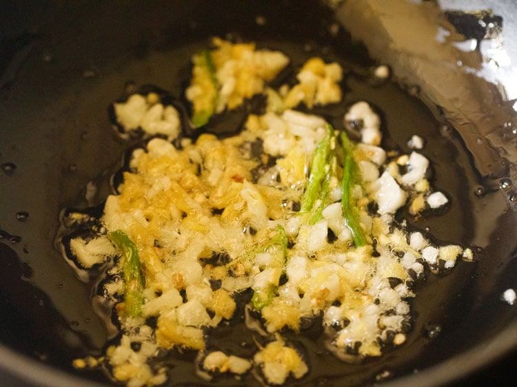 sautéing garlic, ginger and green chilies