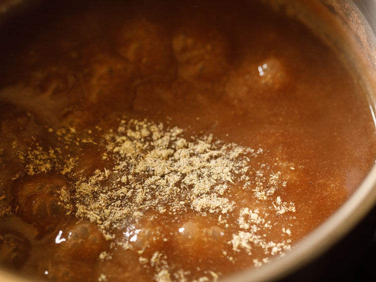 cardamom powder adding the ragi porridge