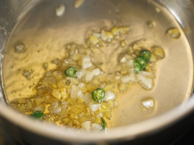 sautéing ginger, garlic and green chilli