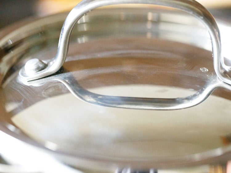 kahwa tea steeping in a pan covered with lid.