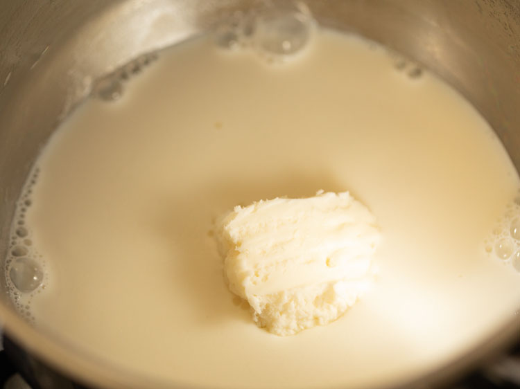 butter added to milk in the pan.
