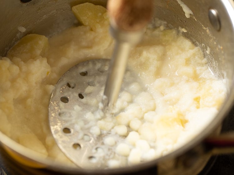 mashing potatoes