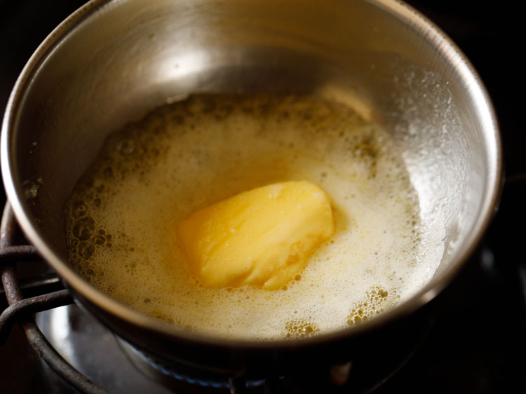 melting butter in a pan. 