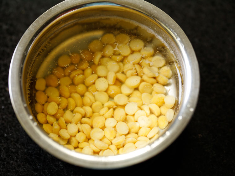 soaking chana dal in hot water for thattai recipe. 