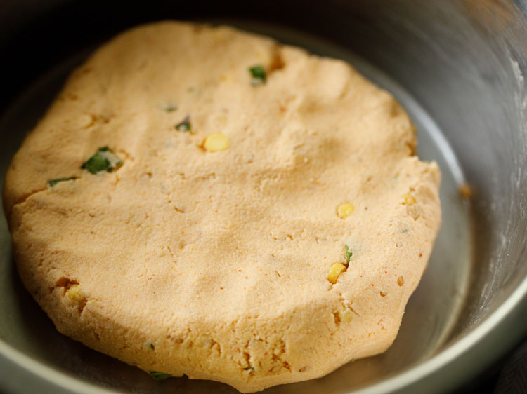 chana dal mixed well into the flour mixture and kneaded to a smooth, semi soft dough. 