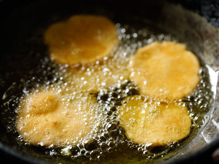 frying thattai rounds in medium hot oil. 