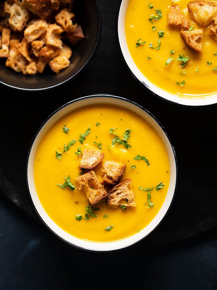 carrot soup served in bowls