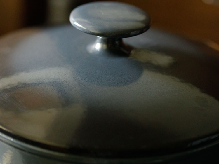 pan covered with lid and soup being simmered for 30 minutes.