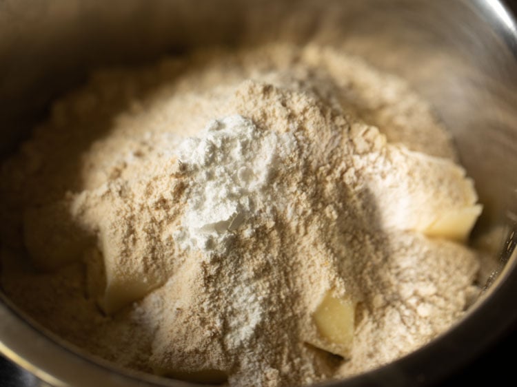 whole wheat flour, salt, baking powder added on the butter cubes