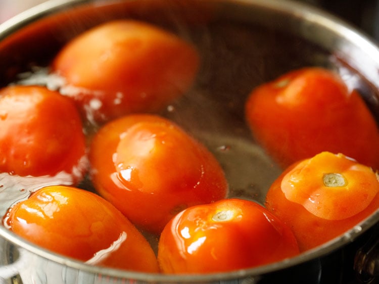 tomatoes immersed in the hot water for 10 to 15 minutes.