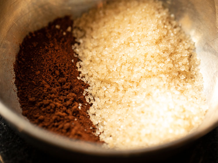 instant coffee and sugar added in a mixing bowl. 