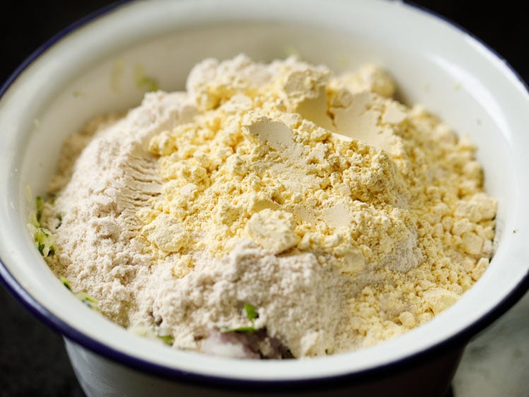 whole wheat flour and chickpea flour added to the bowl.