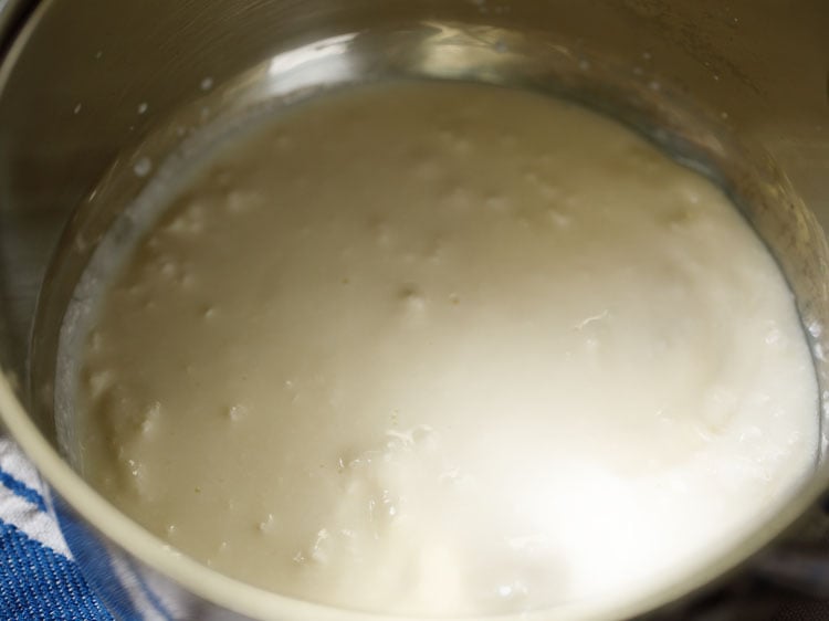 sour curd (yogurt) in a saucepan