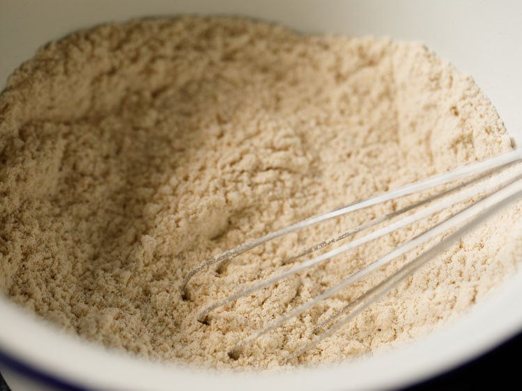 dry ingredients mixed with a whisk