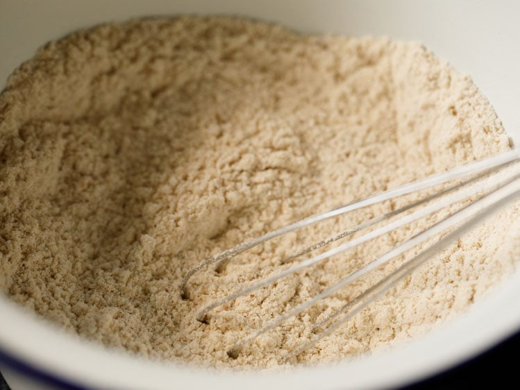 dry ingredients mixed with a whisk.