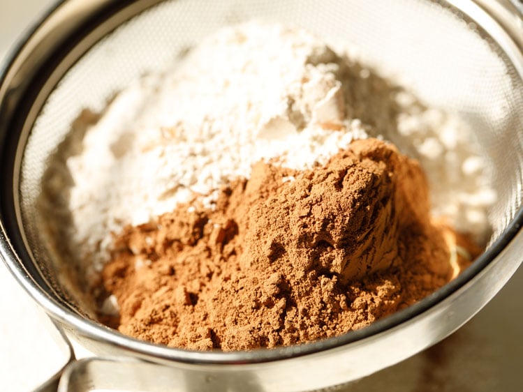 1.25 cups whole wheat flour and ¼ cup cocoa powder in a seive